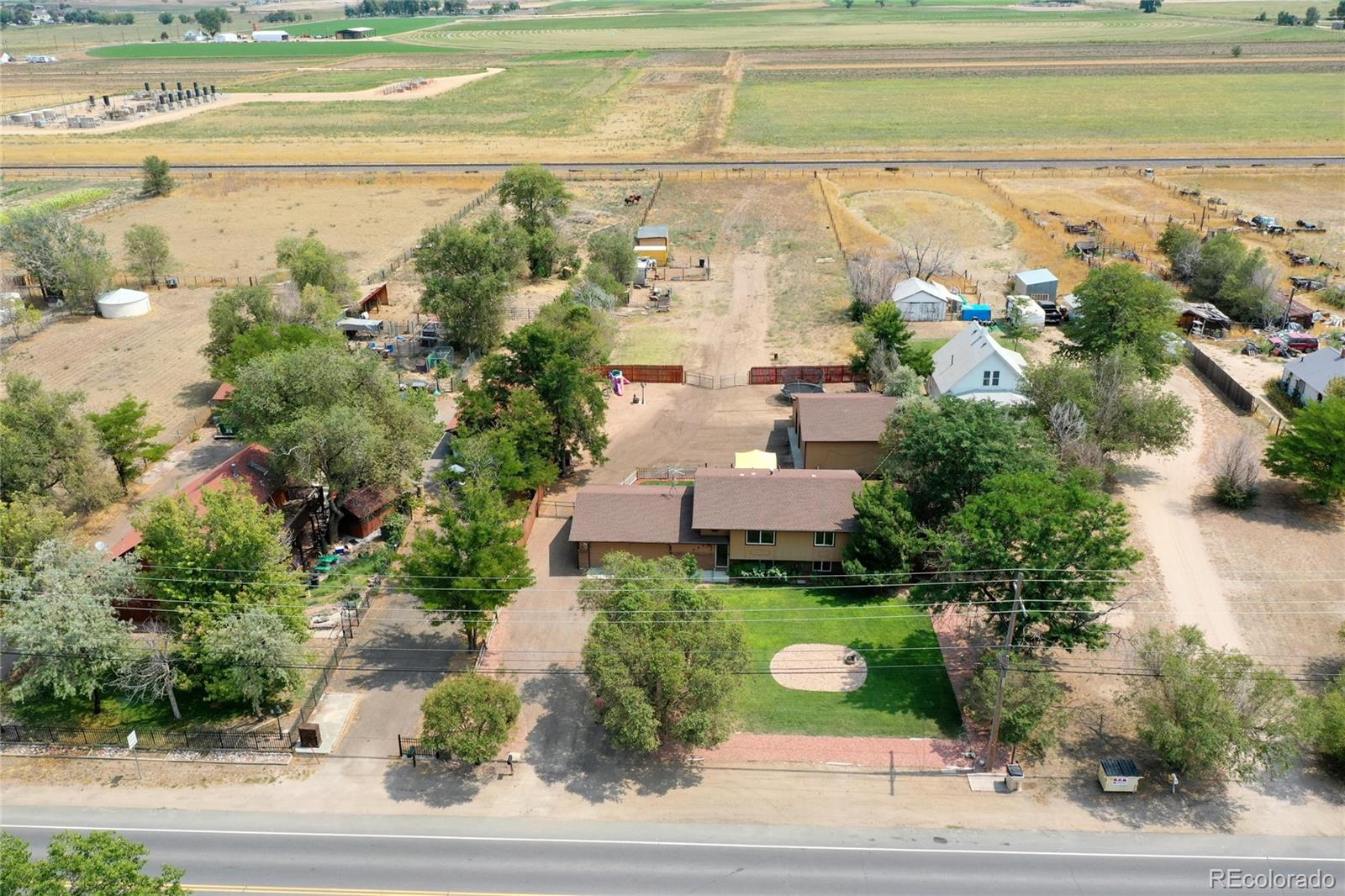 820 South Denver Avenue Fort Lupton, CO 80621 - Photo 36 of 40 a view of a lake with outdoor space