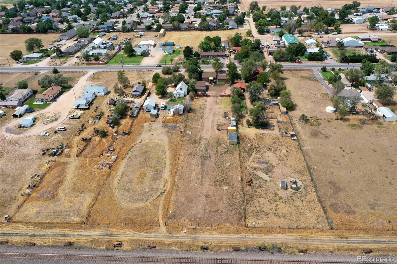820 South Denver Avenue Fort Lupton, CO 80621 - Photo 38 of 40 an aerial view of residential houses with outdoor space