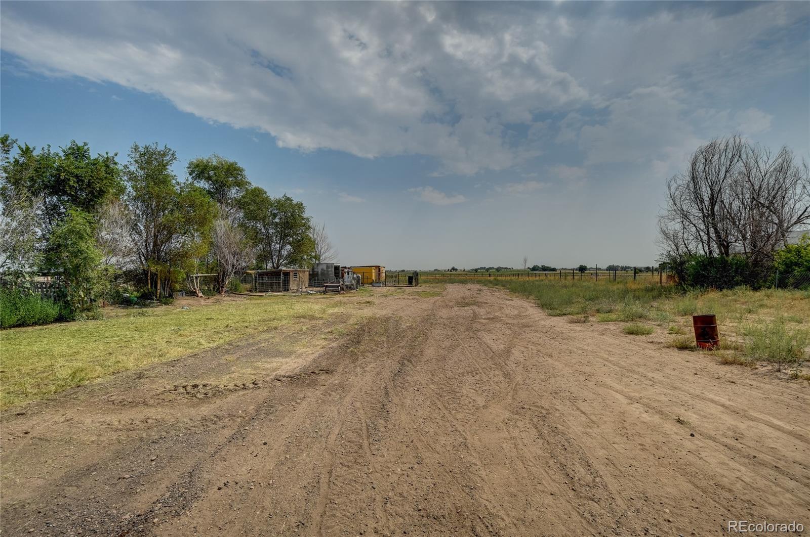 820 South Denver Avenue Fort Lupton, CO 80621 - Photo 40 of 40 a view of a lake with a yard