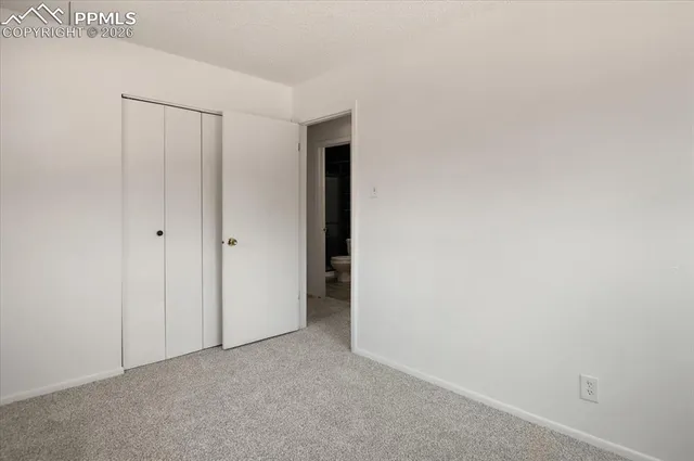 a view of a balcony with wooden floor