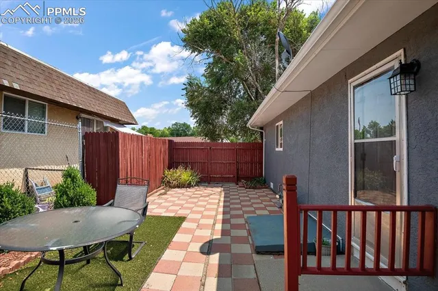 a view of a pathway with a house