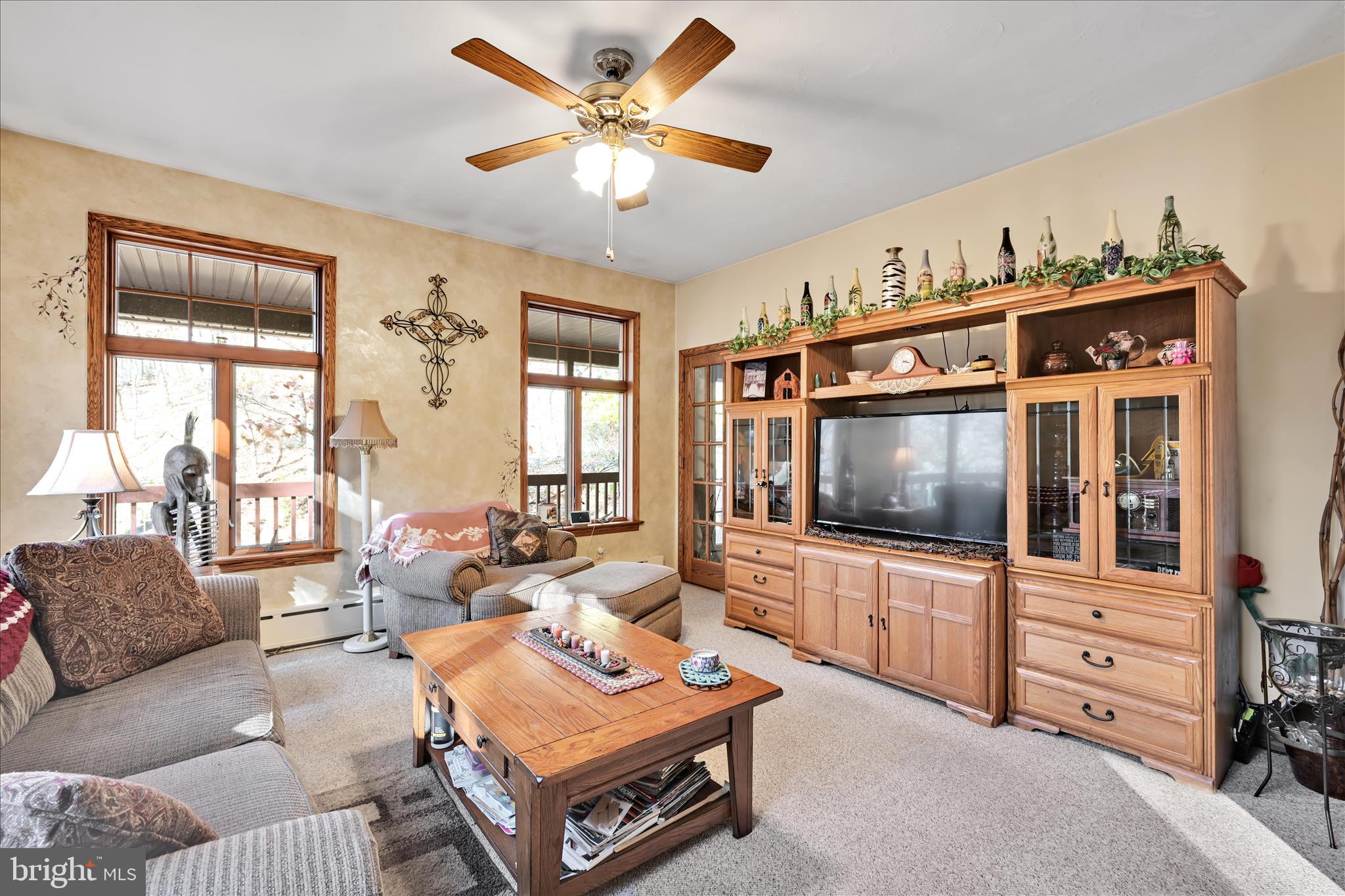 364 Michters Road Newmanstown, PA 17073 - Photo 18 of 56 a living room with furniture and a flat screen tv