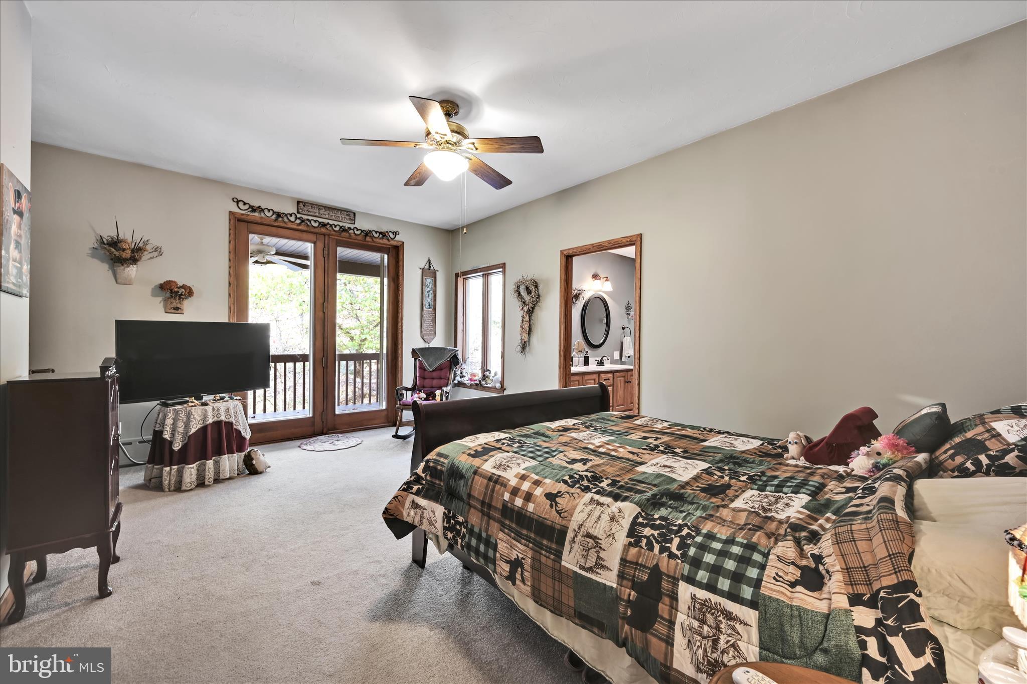 364 Michters Road Newmanstown, PA 17073 - Photo 29 of 56 a bedroom with a bed a couch and dresser