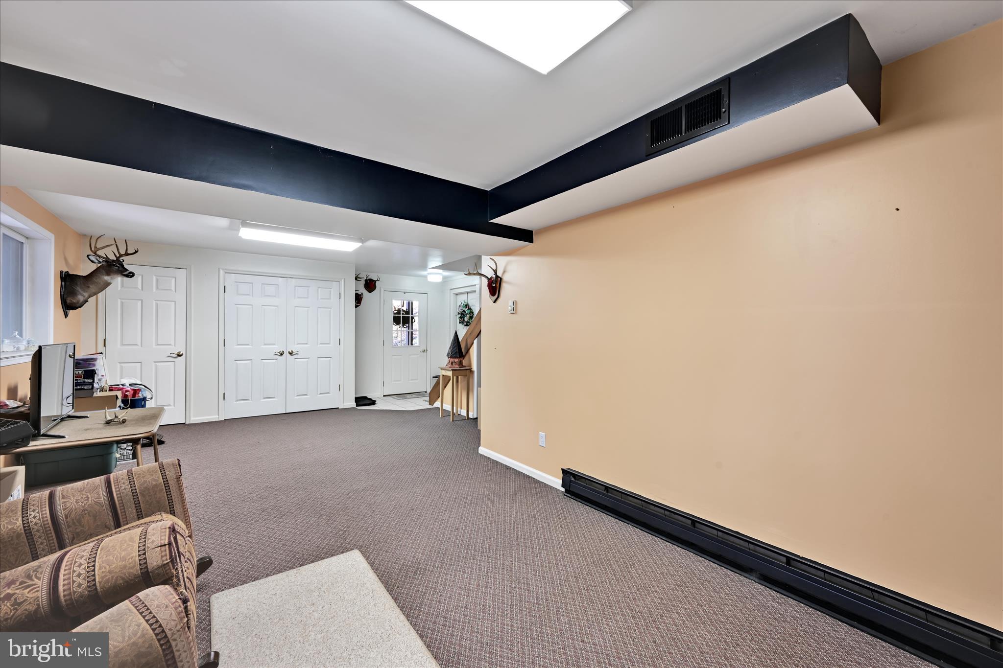 364 Michters Road Newmanstown, PA 17073 - Photo 48 of 56 a view of a livingroom with furniture and a projector