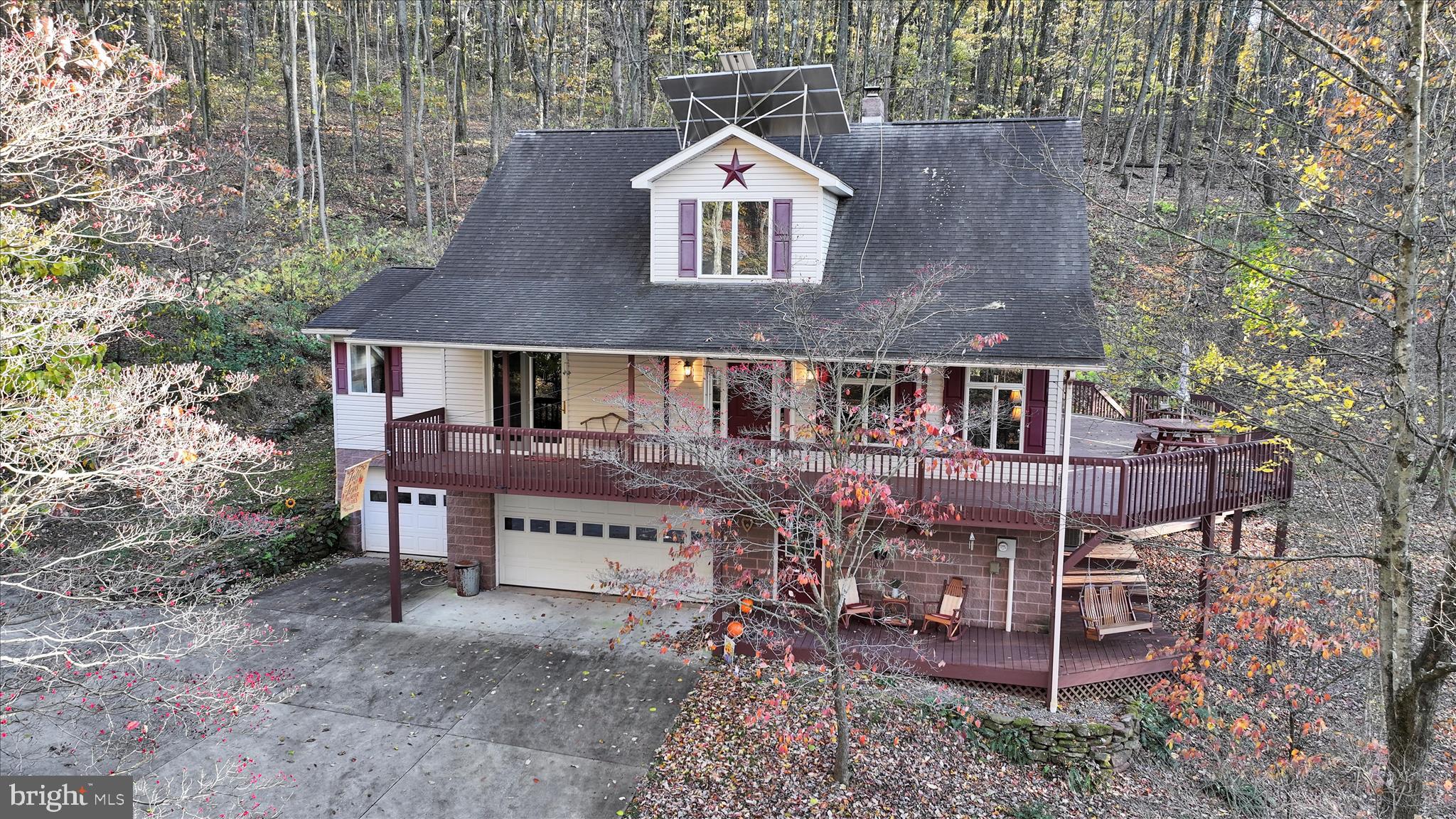 364 Michters Road Newmanstown, PA 17073 - Photo 6 of 56 a house with a bench in front of it