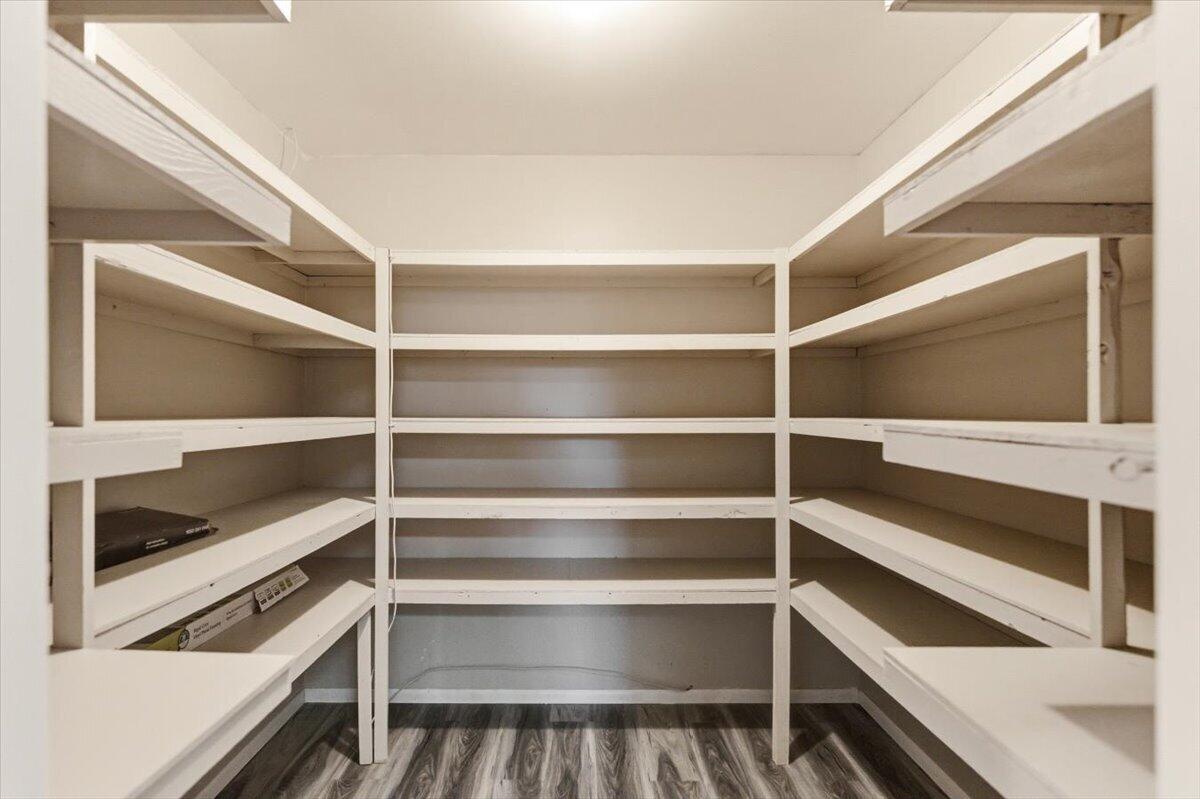 15617 Sherwood Road Weed, CA 96094 - Photo 28 of 58 a view of walk in closet with empty racks