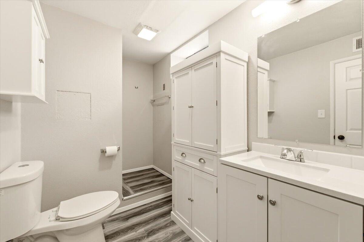 15617 Sherwood Road Weed, CA 96094 - Photo 34 of 58 a bathroom with a sink a toilet a shower and a mirror