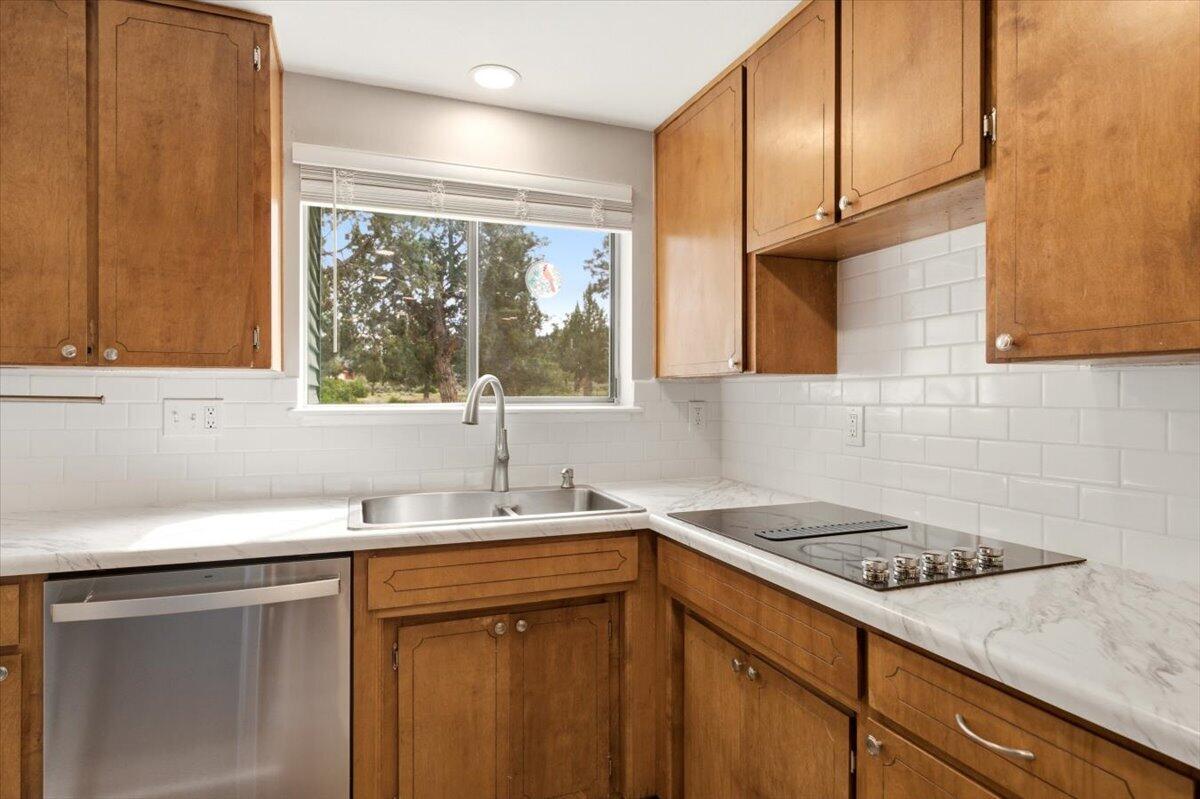 15617 Sherwood Road Weed, CA 96094 - Photo 9 of 58 a kitchen with a sink cabinets and window
