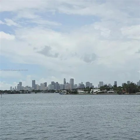 a view of a lake with a city view