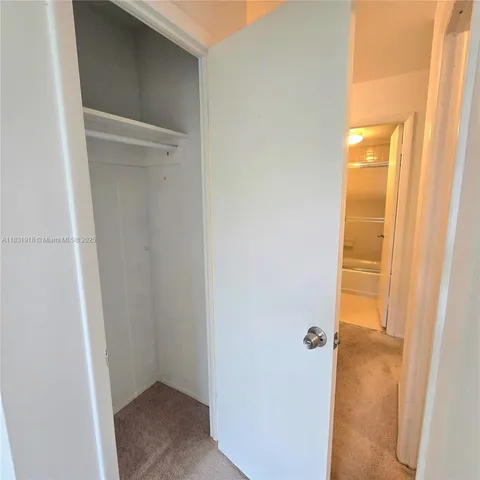 an outdoor view with swimming pool and seating