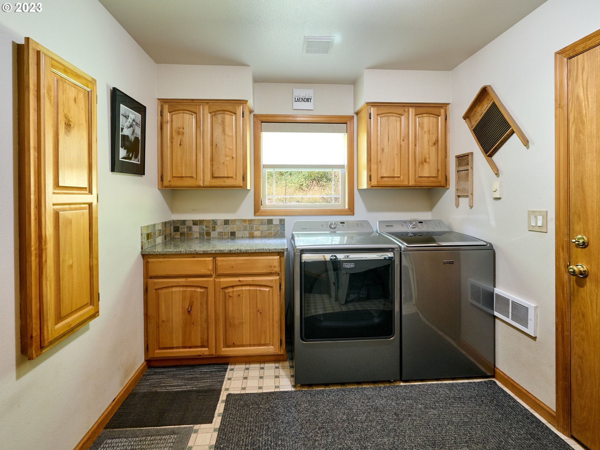 15360 May Road Dallas, OR 97338 - Photo 21 of 48 a kitchen with stainless steel appliances granite countertop a stove a sink and a refrigerator