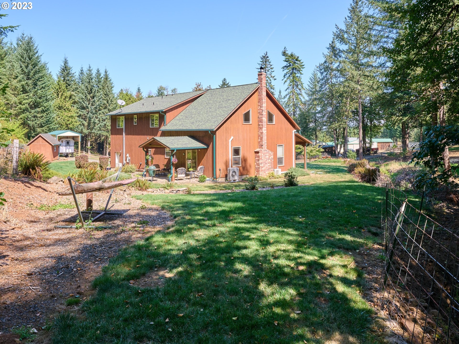 15360 May Road Dallas, OR 97338 - Photo 23 of 48 a view of backyard of the house