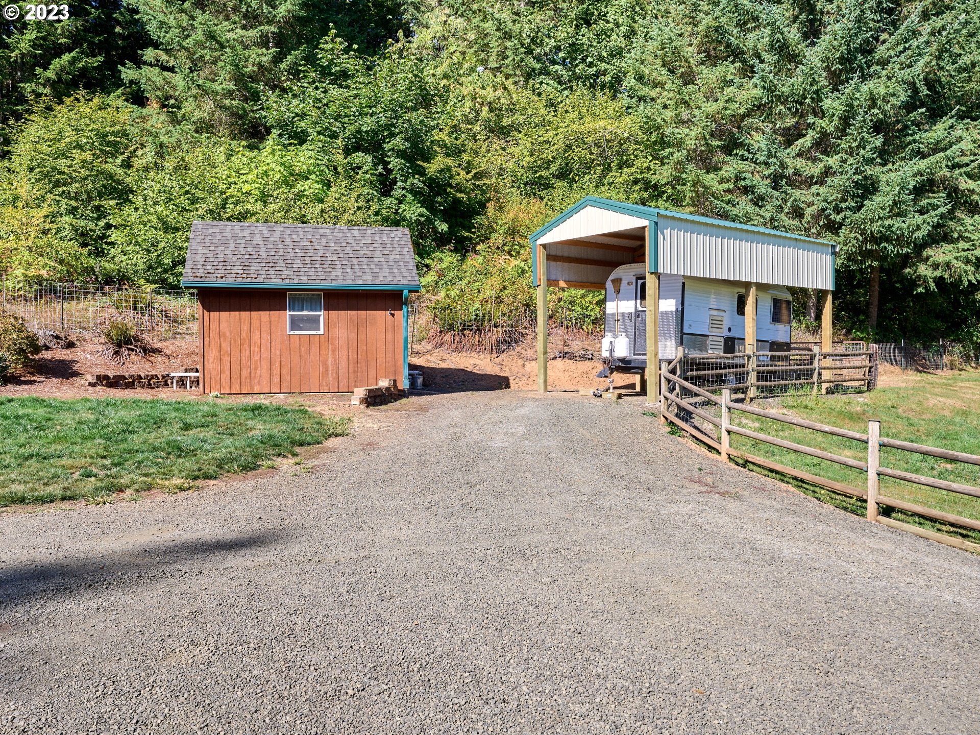 15360 May Road Dallas, OR 97338 - Photo 24 of 48 a view of a house with backyard and sitting area