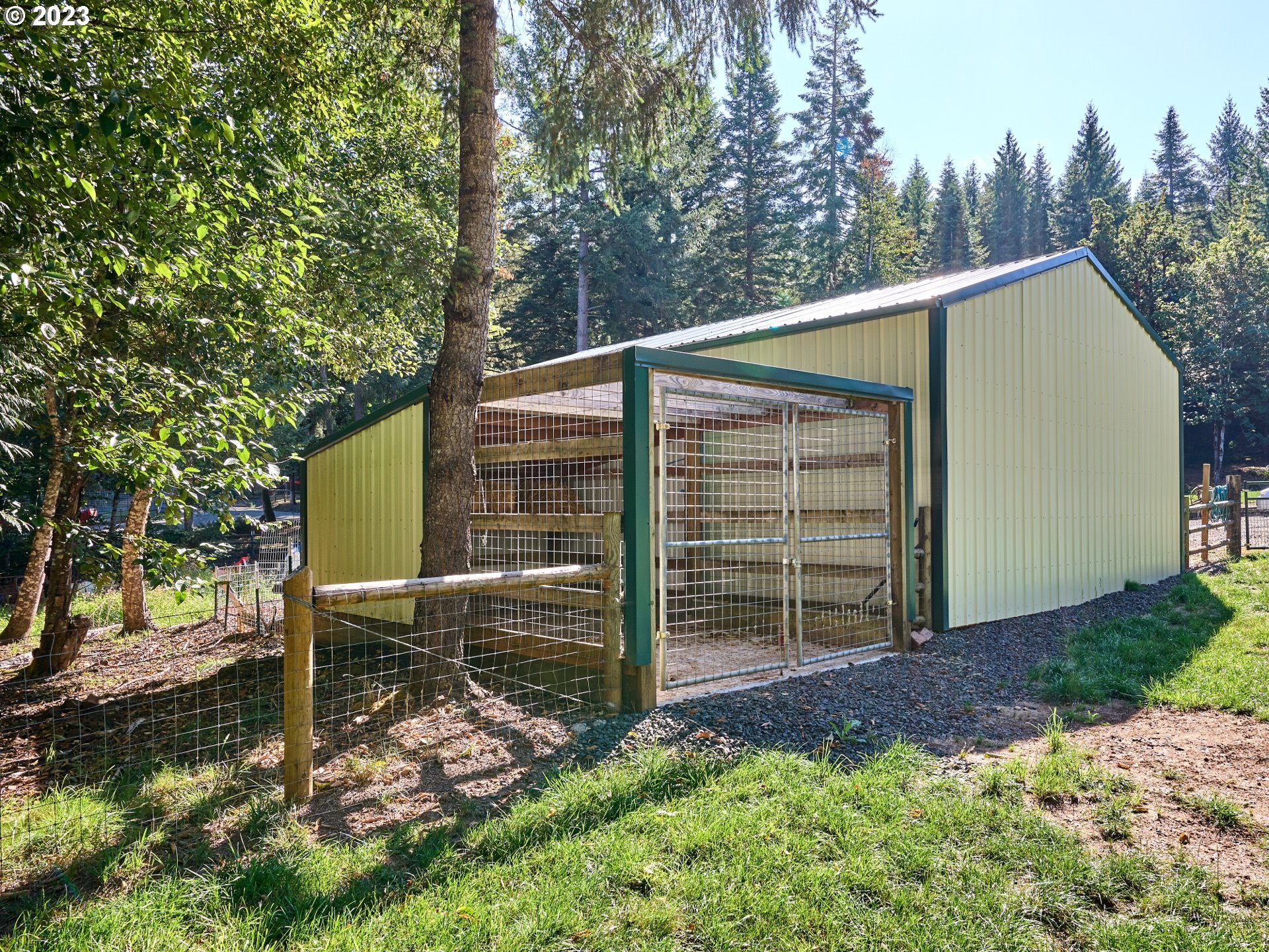 15360 May Road Dallas, OR 97338 - Photo 26 of 48 a view of a backyard with a small cabin