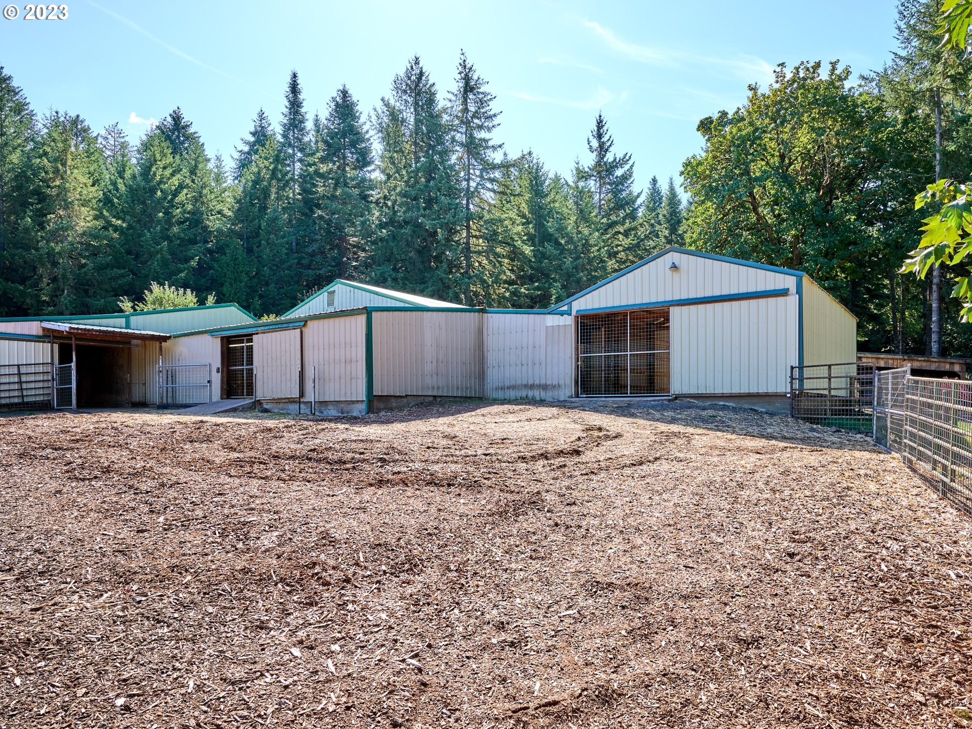 15360 May Road Dallas, OR 97338 - Photo 29 of 48 a front view of a house with a yard and garage