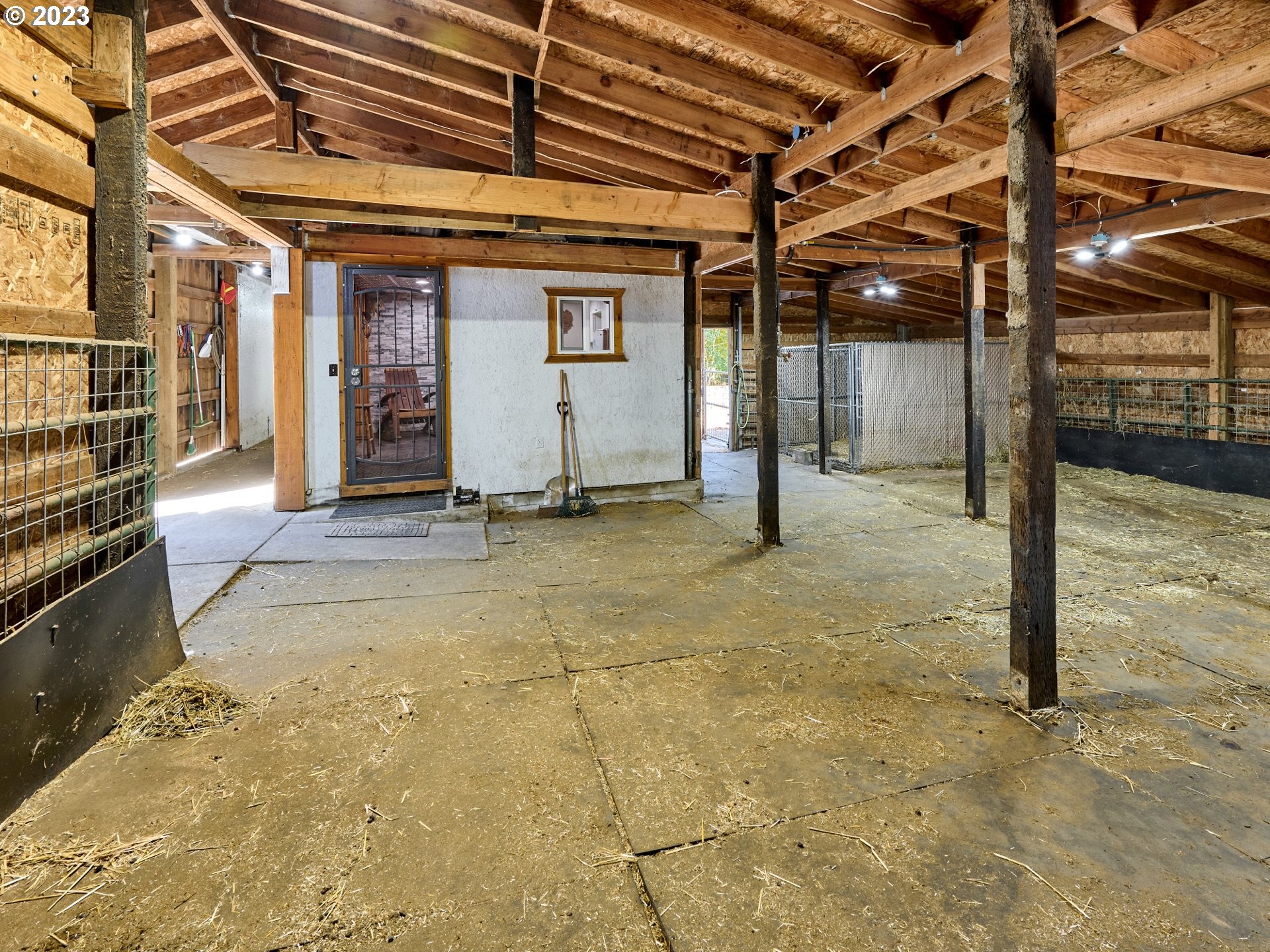 15360 May Road Dallas, OR 97338 - Photo 34 of 48 a view of a hall with wooden floor