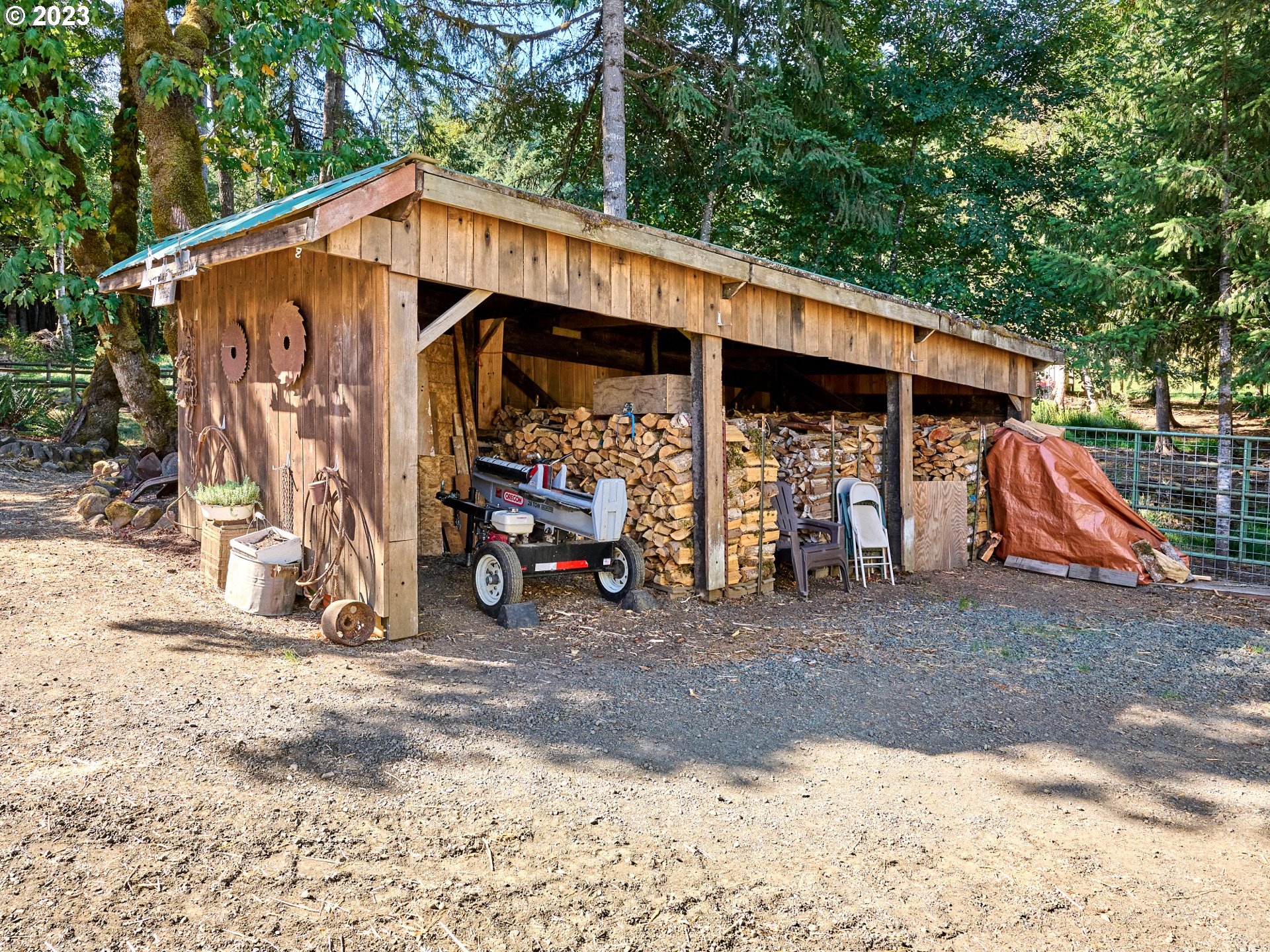 15360 May Road Dallas, OR 97338 - Photo 37 of 48 a view of a house with a patio