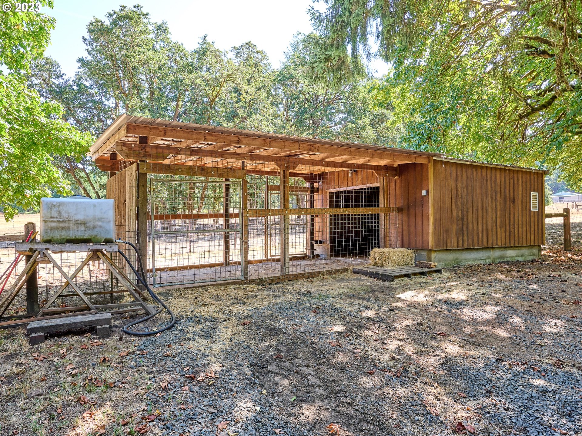 15360 May Road Dallas, OR 97338 - Photo 45 of 48 a view of a house with backyard