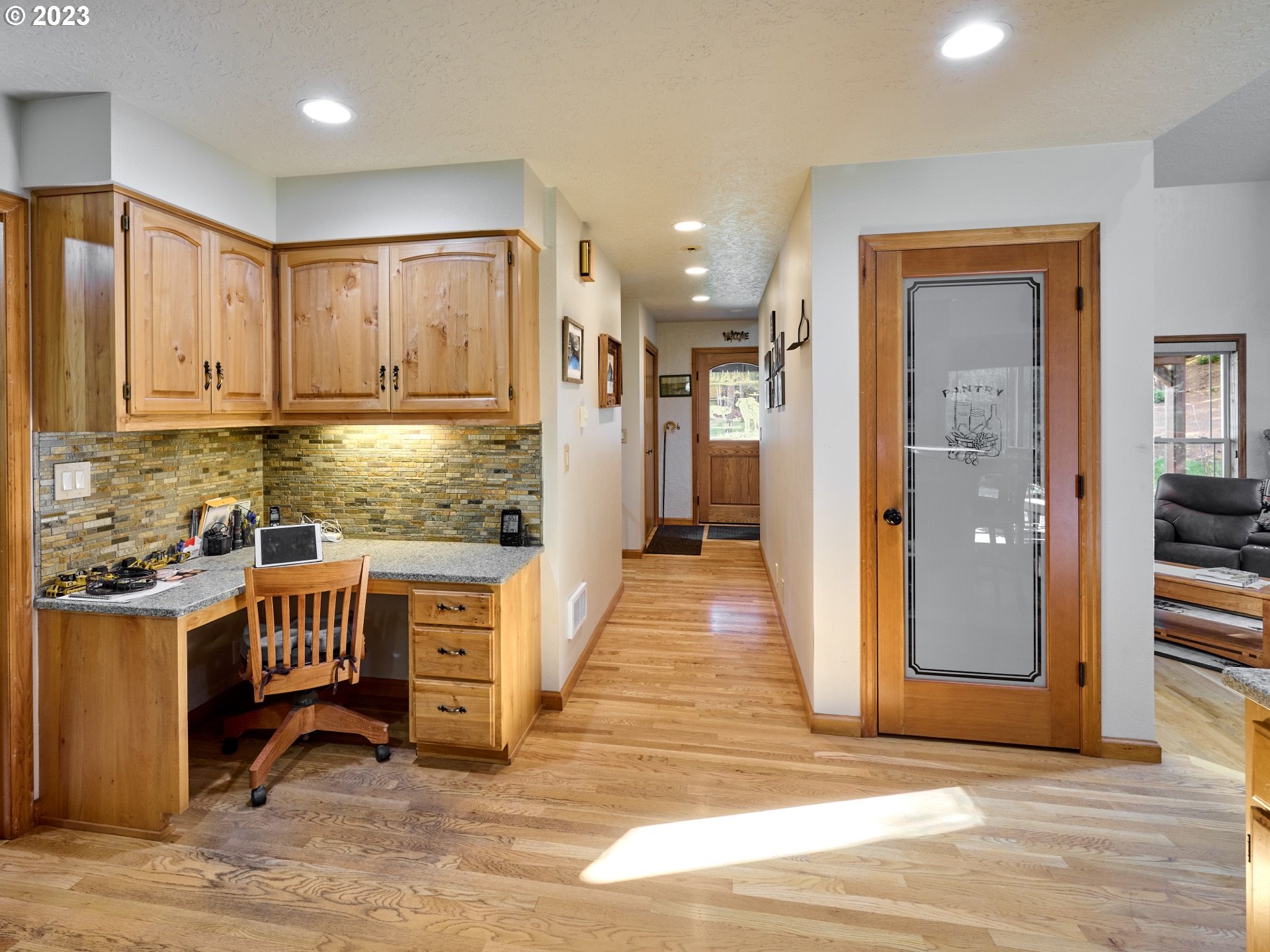 15360 May Road Dallas, OR 97338 - Photo 8 of 48 a view of kitchen with stainless steel appliances granite countertop cabinets and a couch