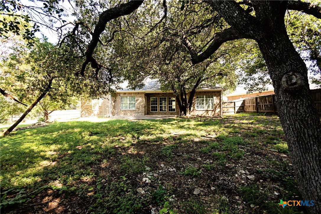 115 Squire Loop Belton, TX 76513 - Photo 37 of 38 a front view of a house with a yard
