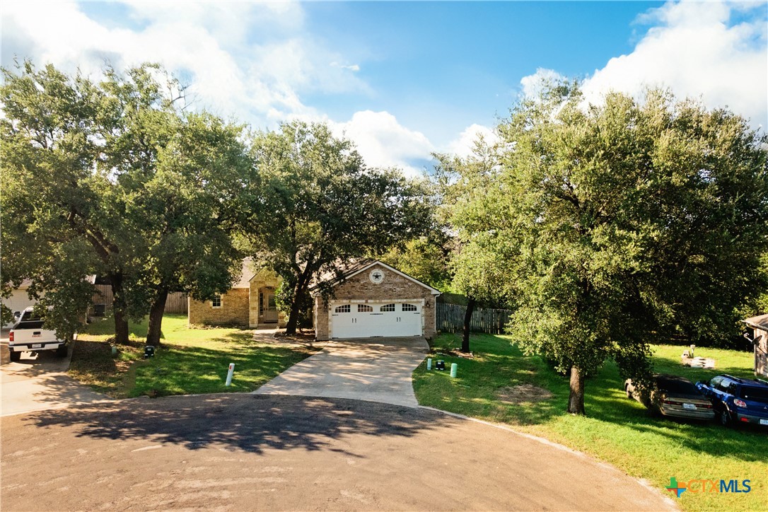115 Squire Loop Belton, TX 76513 - Photo 4 of 38 a house view with a car parked in front of it