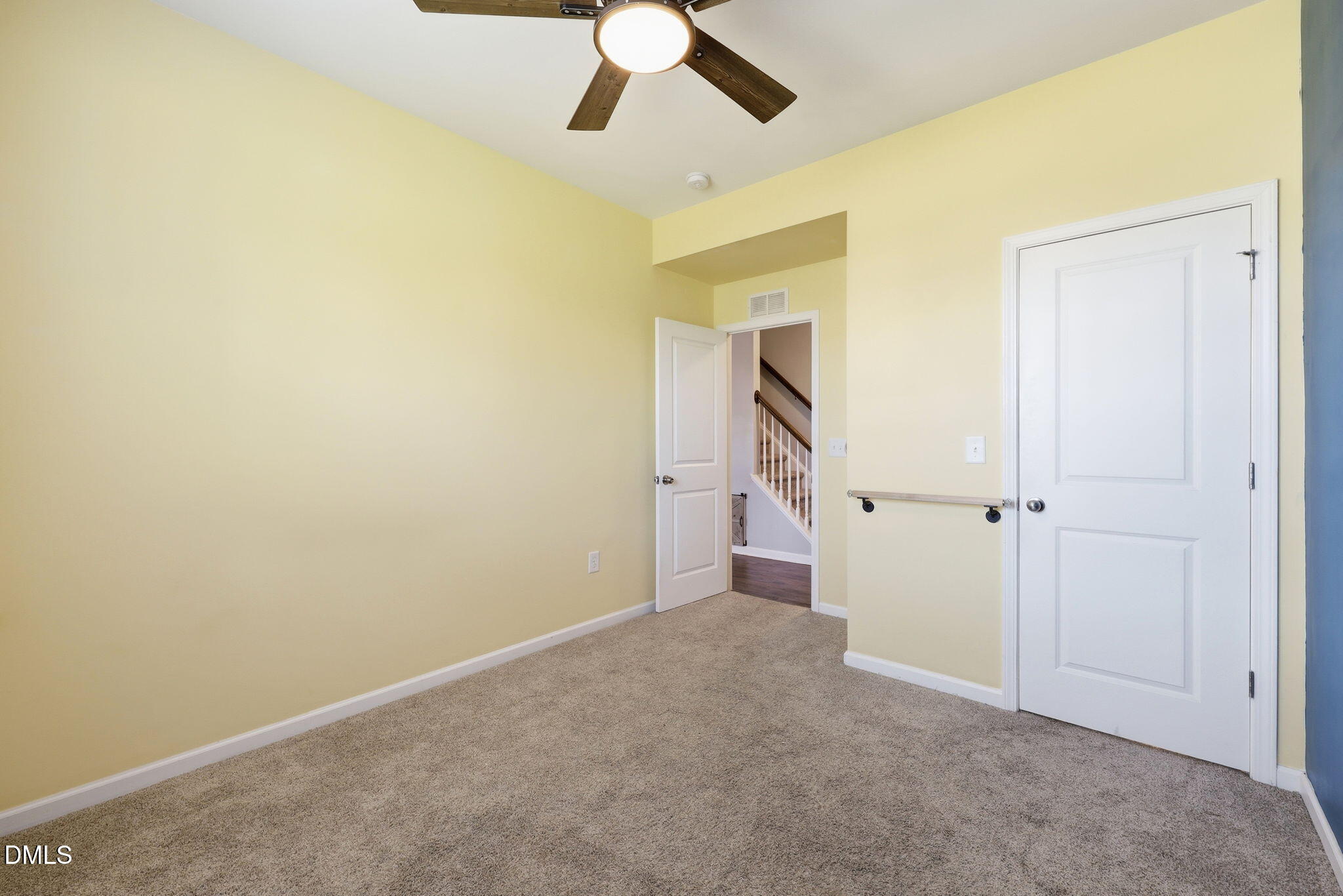 1808 Austin Rdg Parkway Wake Forest, NC 27587 - Photo 22 of 57 an empty room with a ceiling fan and carpet