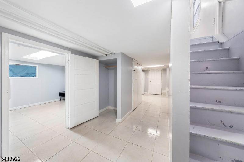 828 Allen Street Linden, NJ 07036 - Photo 17 of 18 a view of an empty walk in closet