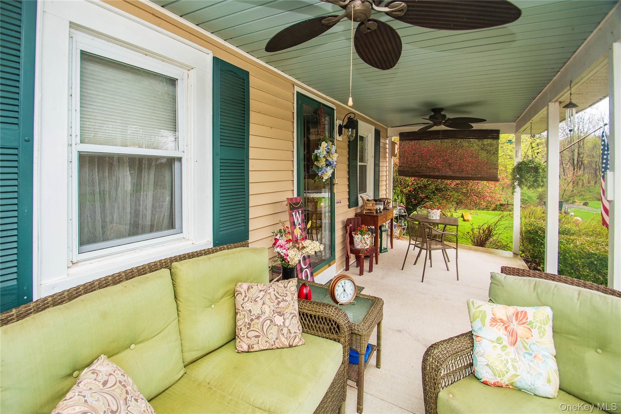 62 Thornton Road Wurtsboro, NY 12790 - Photo 8 of 30 a outdoor living space with furniture and a potted plant