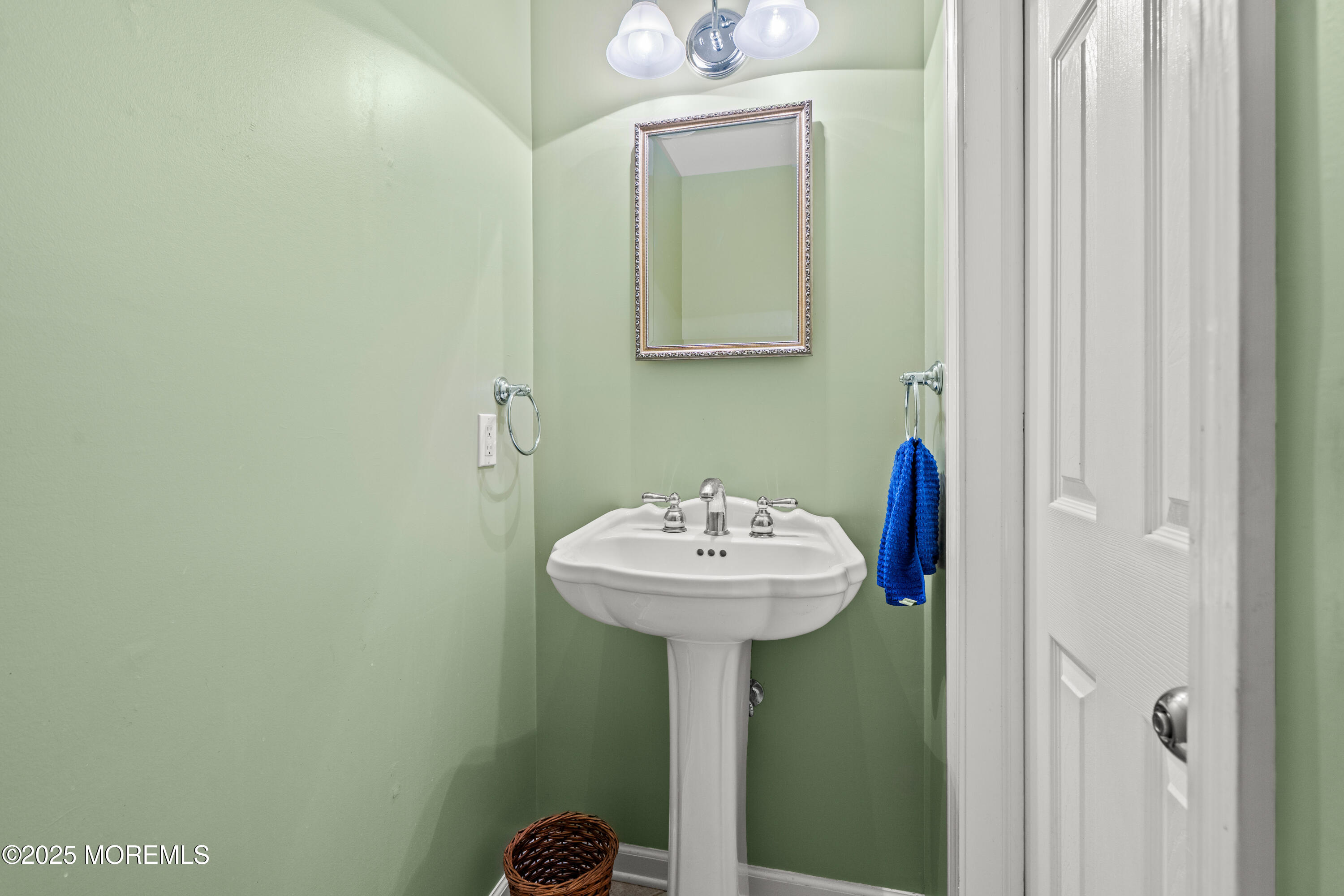 4 Brookside Drive Colts Neck, NJ 07722 - Photo 12 of 46 a bathroom with a sink and a mirror