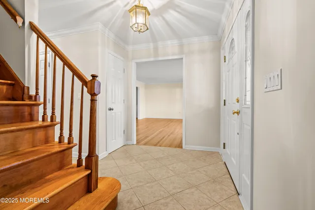 a view of an entryway with staircase