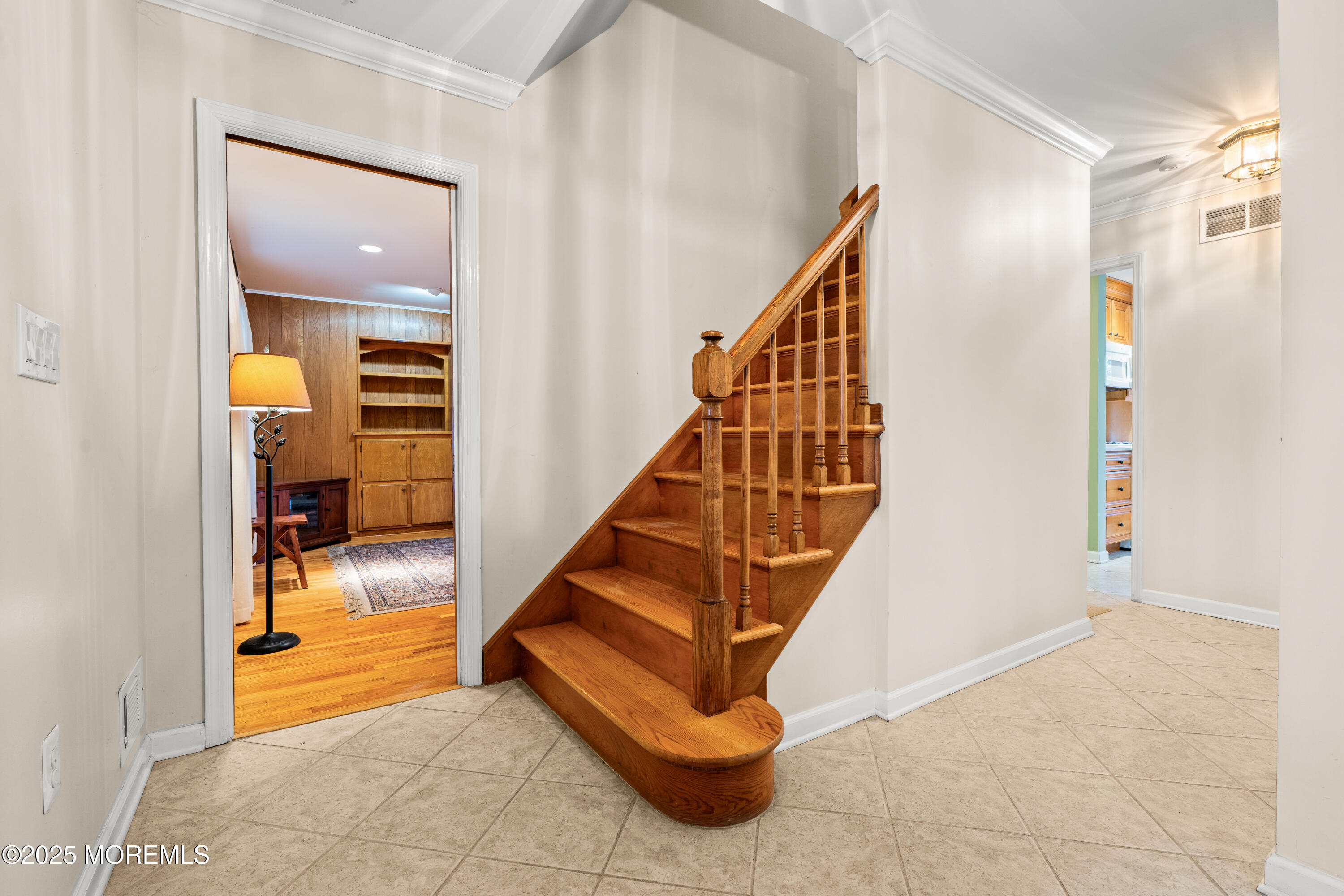 4 Brookside Drive Colts Neck, NJ 07722 - Photo 24 of 46 a view of entryway and hall with a workspace