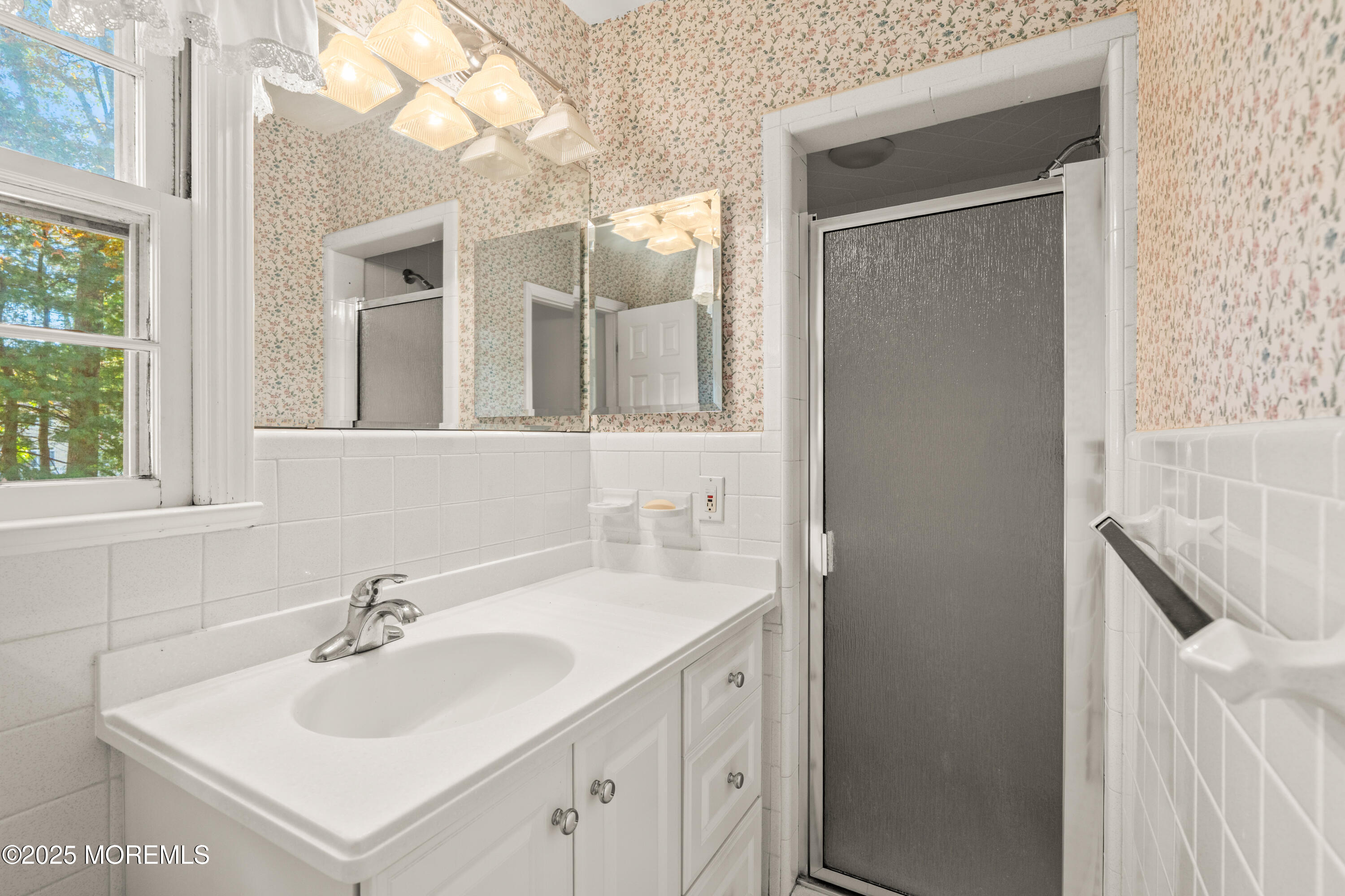 4 Brookside Drive Colts Neck, NJ 07722 - Photo 33 of 46 a bathroom with a sink and a mirror