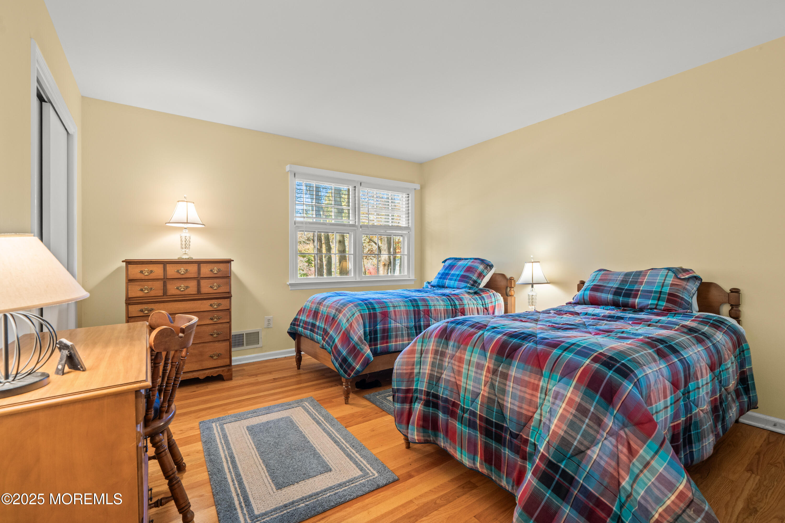 4 Brookside Drive Colts Neck, NJ 07722 - Photo 37 of 46 a bedroom with two beds and a flat screen tv