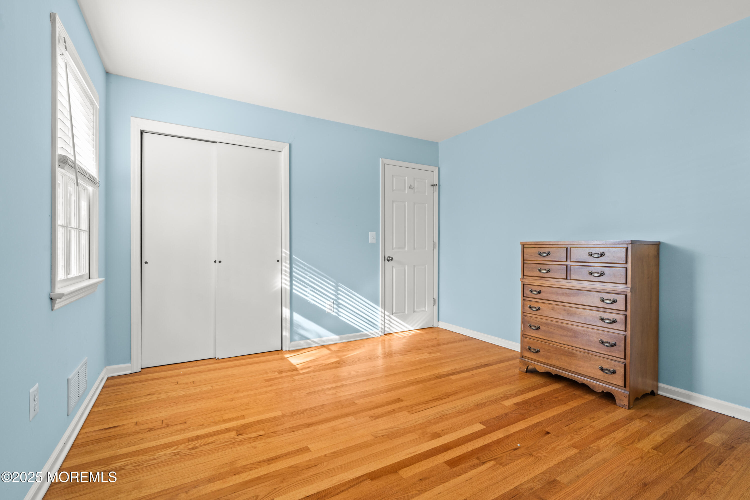 4 Brookside Drive Colts Neck, NJ 07722 - Photo 42 of 46 a bedroom with a bed and a dresser