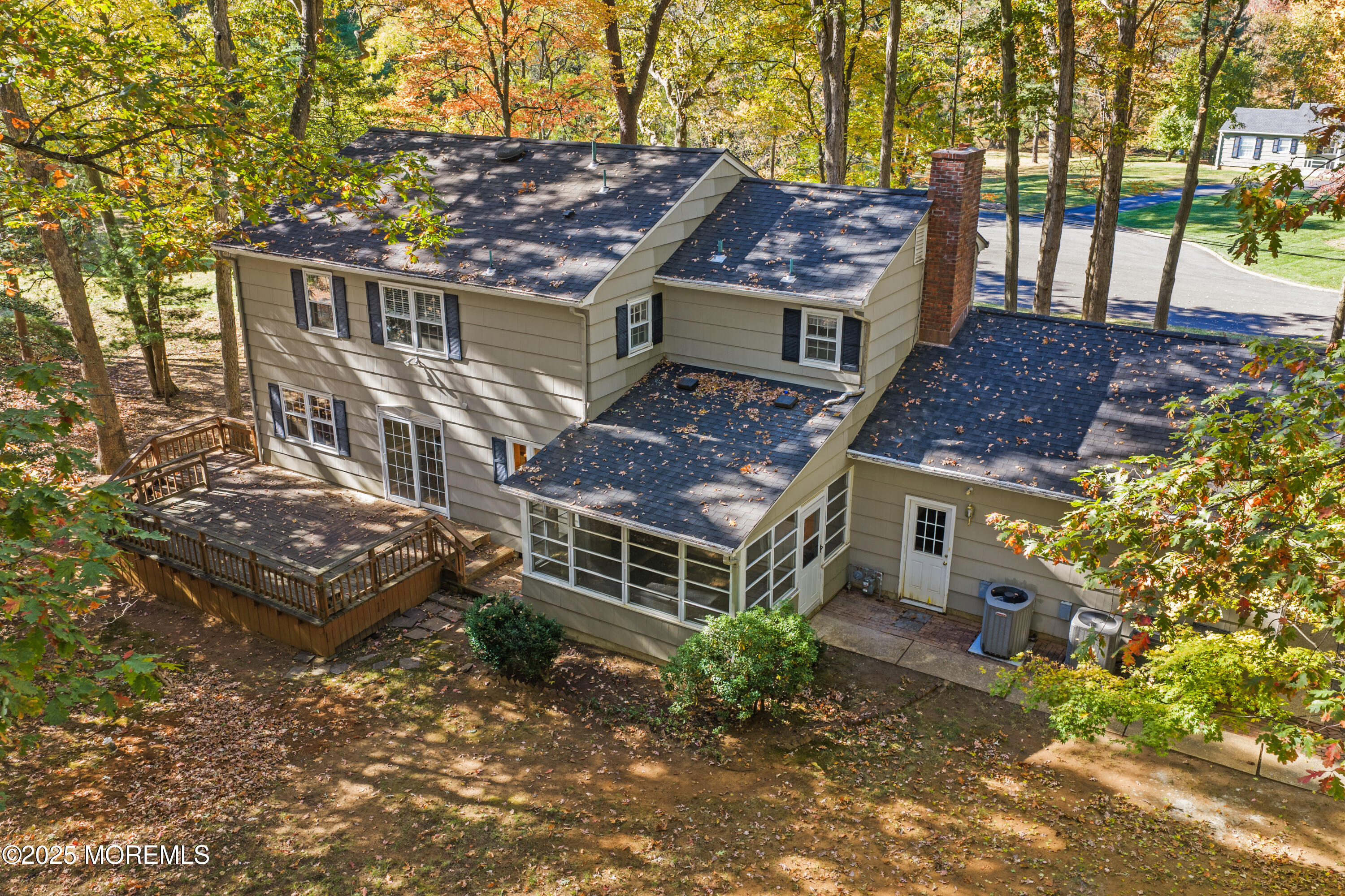 4 Brookside Drive Colts Neck, NJ 07722 - Photo 43 of 46 front view of a house with a yard