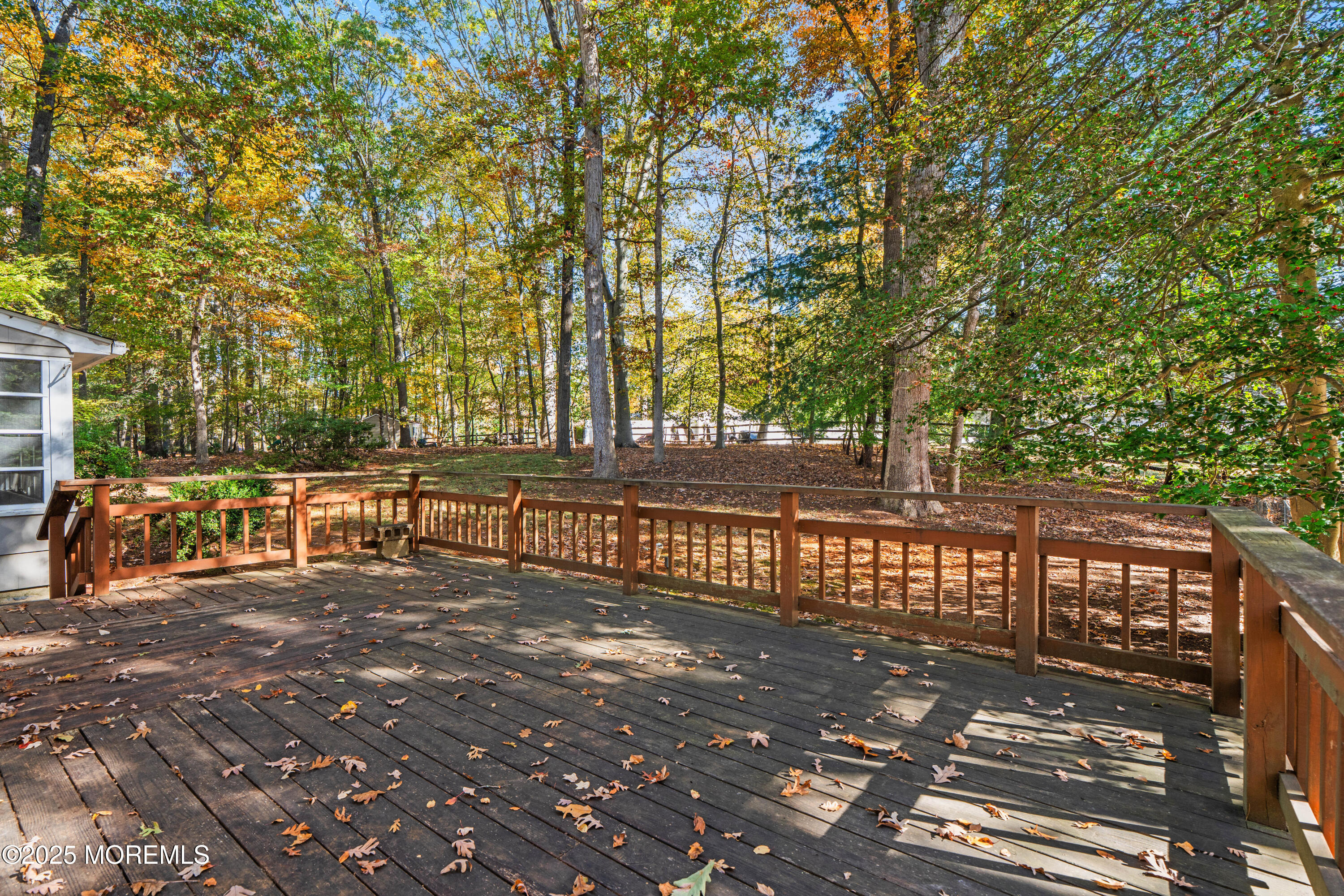 4 Brookside Drive Colts Neck, NJ 07722 - Photo 44 of 46 a view of a balcony with trees