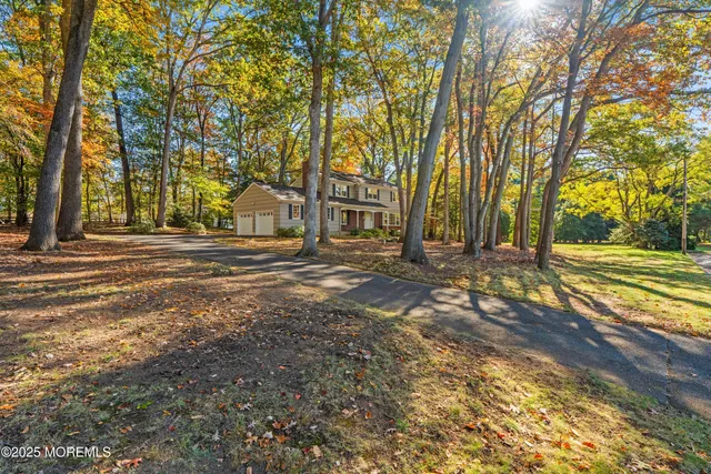 a view of a house with a big yard