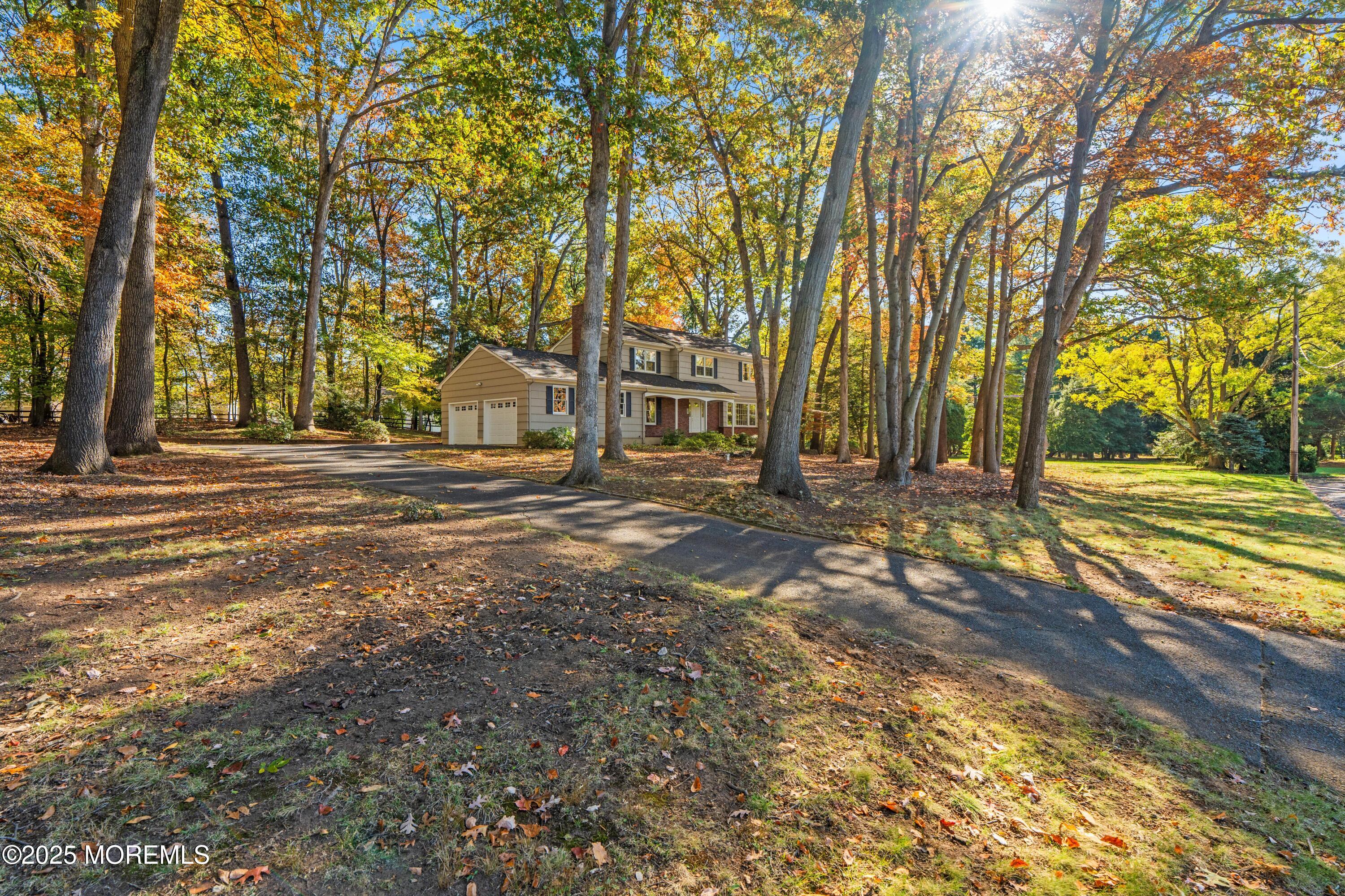 4 Brookside Drive Colts Neck, NJ 07722 - Photo 5 of 46 a view of a house with a big yard