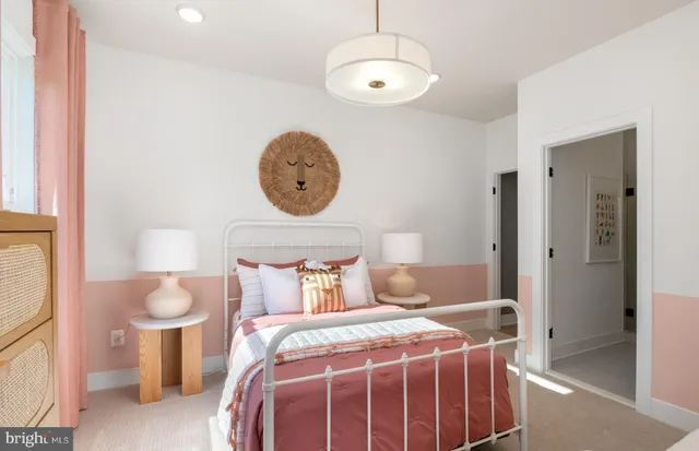 a bedroom with a bed and a cabinets