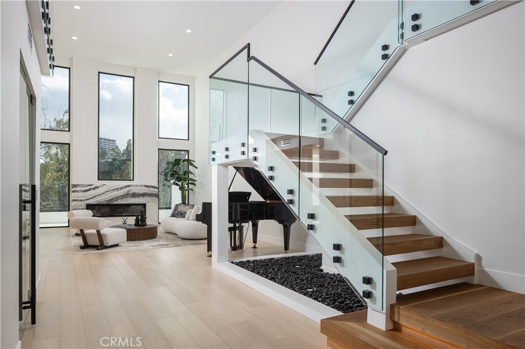 7 Rue Villars Newport Beach, CA 92660 - Photo 1 of 1 a view of entryway and hall with wooden floor
