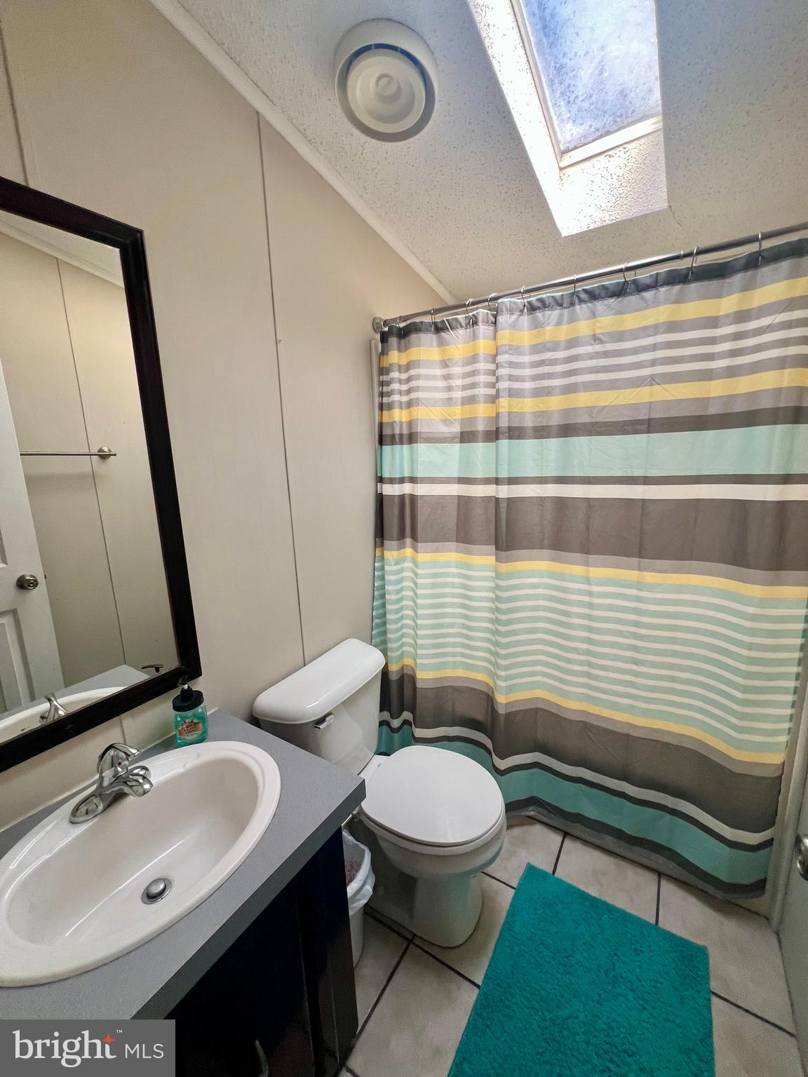 768 East Garden Road, Unit 14 Vineland, NJ 08360 - Photo 21 of 33 a bathroom with a sink a toilet and shower