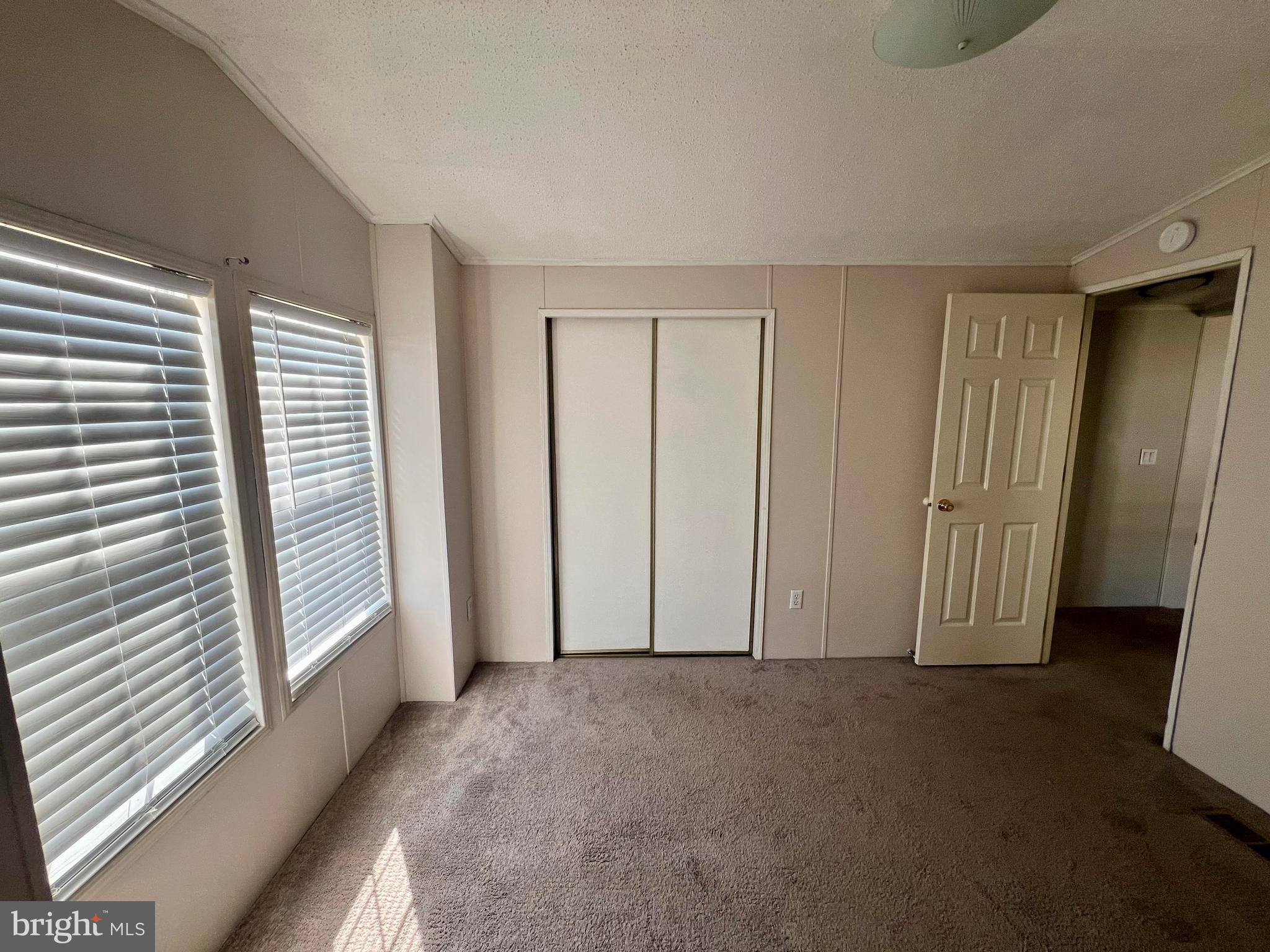768 East Garden Road, Unit 14 Vineland, NJ 08360 - Photo 24 of 33 an empty room with windows
