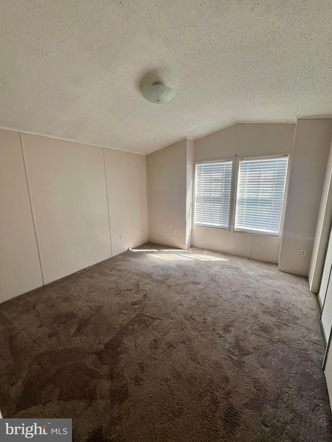 768 East Garden Road, Unit 14 Vineland, NJ 08360 - Photo 25 of 33 a view of an empty room with a window