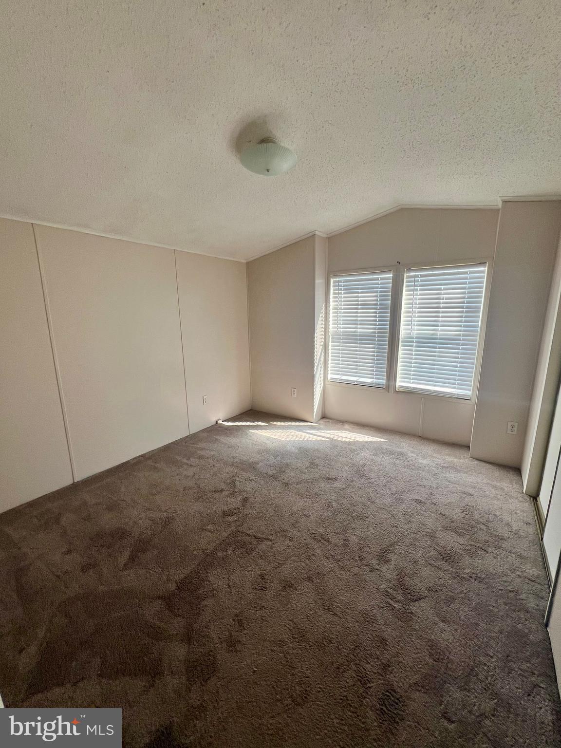 768 East Garden Road, Unit 14 Vineland, NJ 08360 - Photo 26 of 33 a view of an empty room with a window