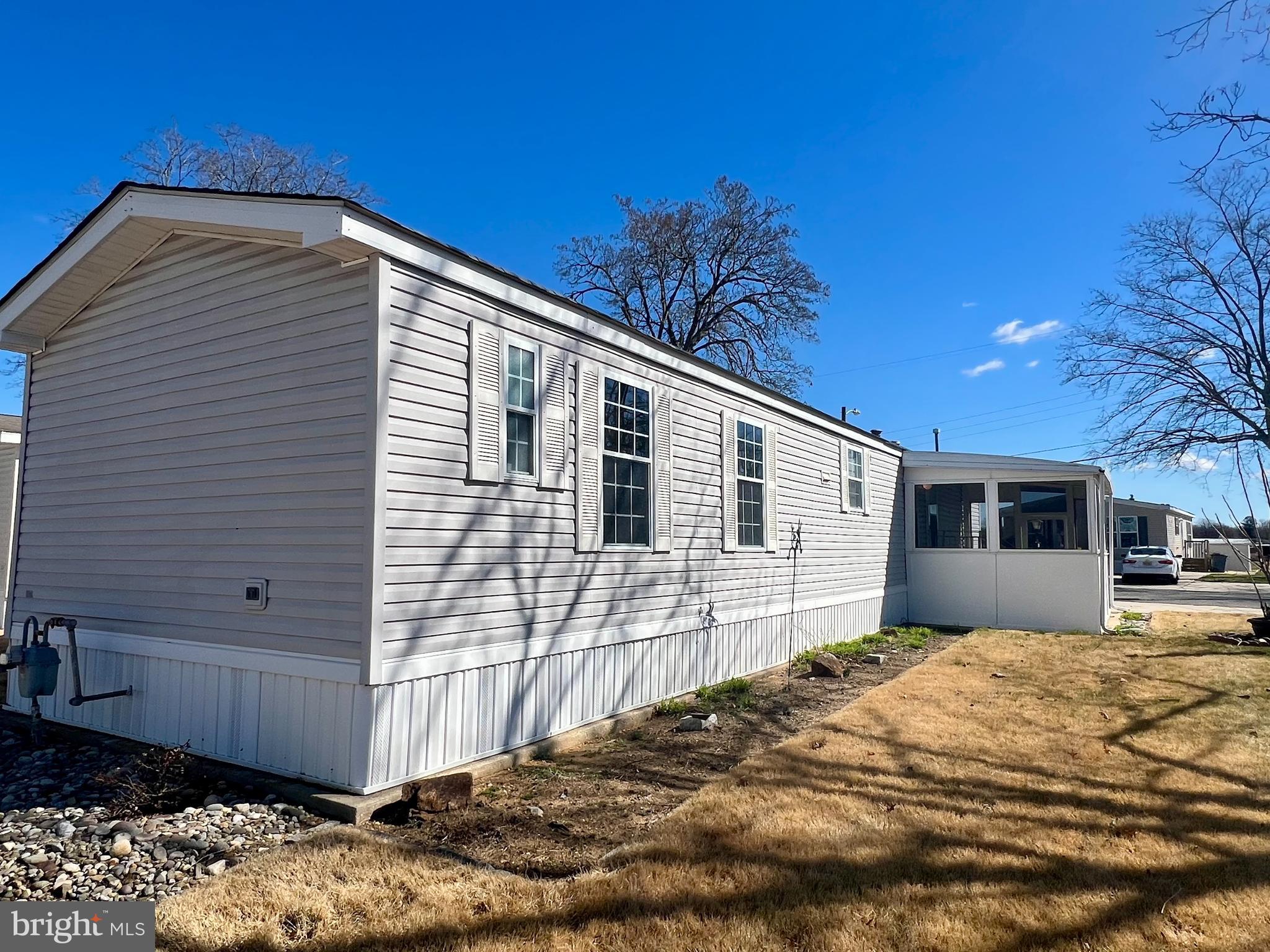 768 East Garden Road, Unit 14 Vineland, NJ 08360 - Photo 3 of 33 a front view of a house with a yard