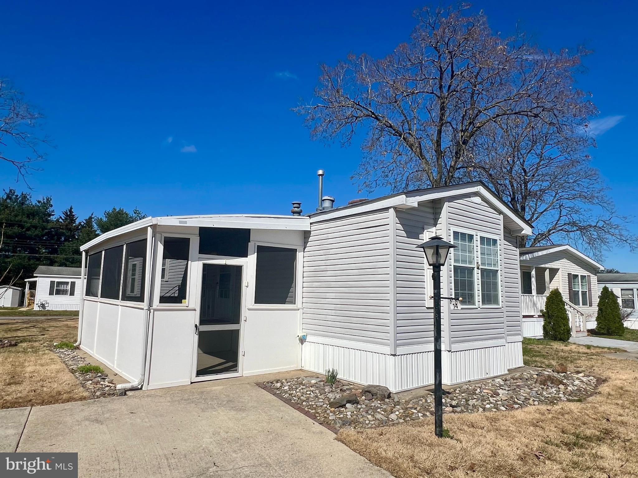 768 East Garden Road, Unit 14 Vineland, NJ 08360 - Photo 33 of 33 a front view of a house with a yard
