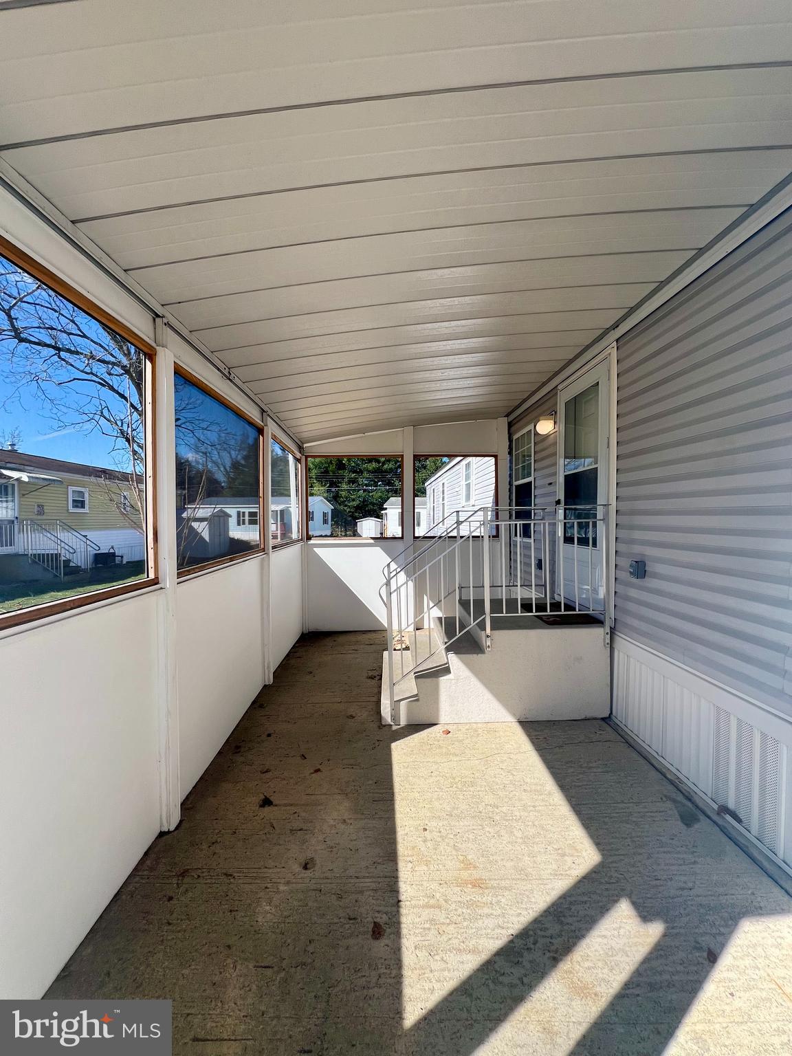 768 East Garden Road, Unit 14 Vineland, NJ 08360 - Photo 4 of 33 a view of a porch with furniture