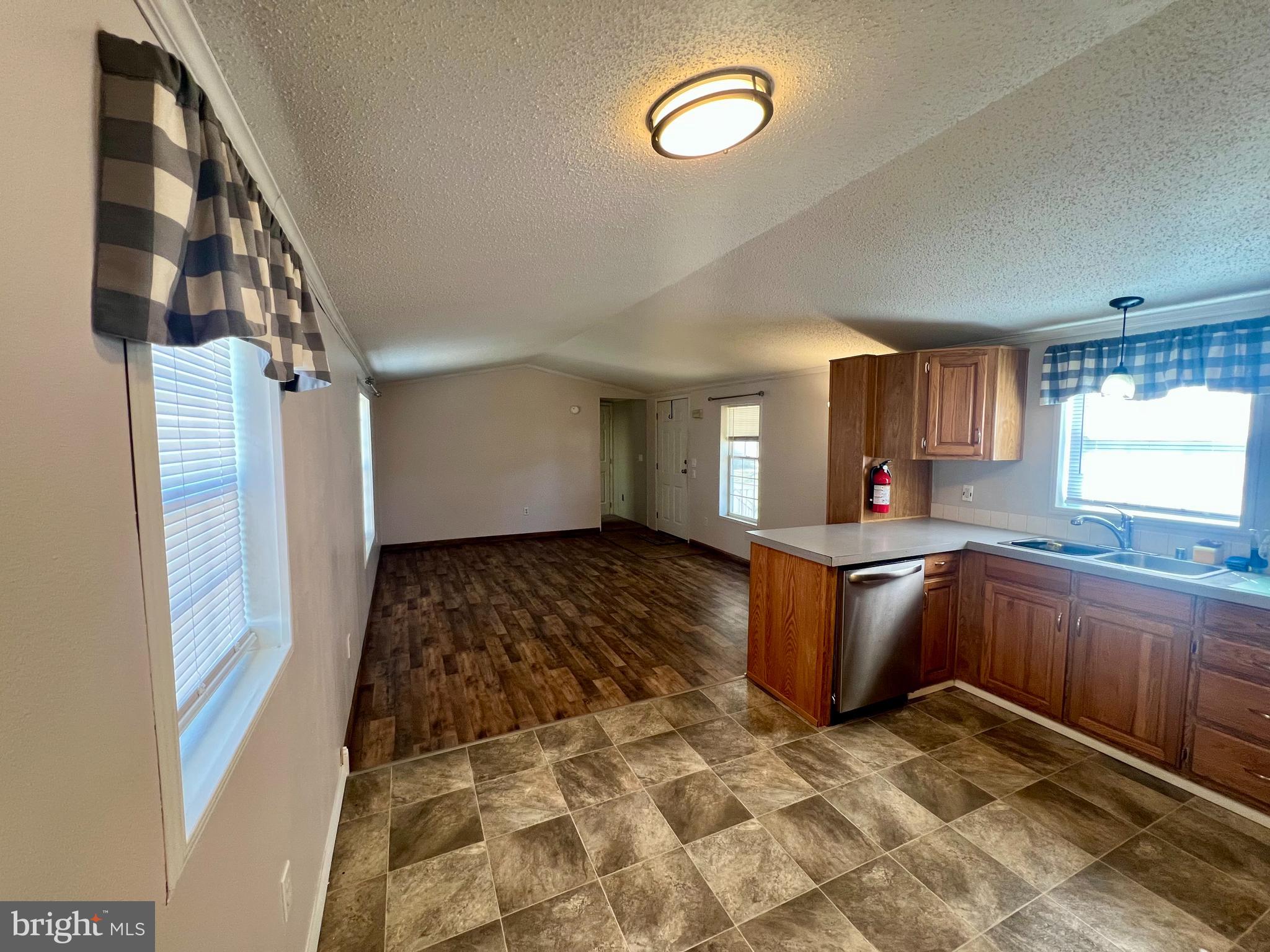 768 East Garden Road, Unit 14 Vineland, NJ 08360 - Photo 10 of 33 a kitchen with a sink and a stove top oven