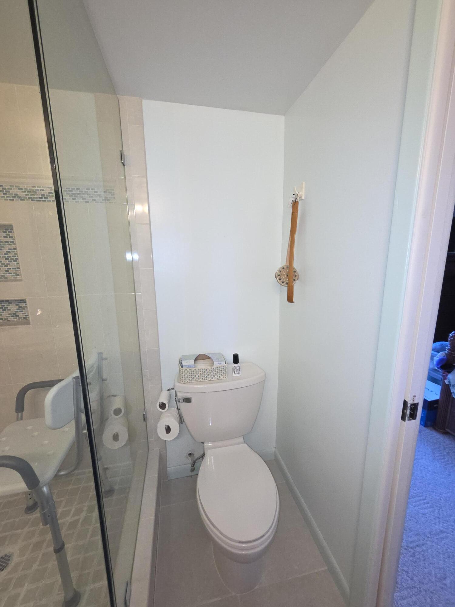 1170 6th Avenue, Unit 3A Vero Beach, FL 32960 - Photo 23 of 31 a bathroom with a sink and toilet