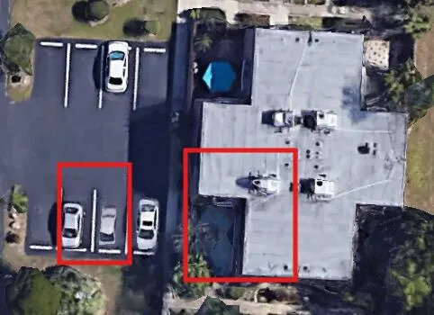 an aerial view of multiple houses with outdoor space